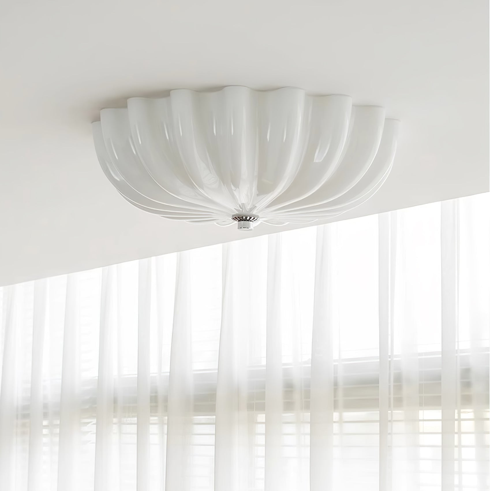 Clérachic Murano-Style Scalloped Glass Flush Ceiling Light in white, fitted at a ceiling edge above floor-length sheer curtains.