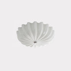 Studio shot of the Clérachic Murano-Style Scalloped Glass Flush Ceiling Light in glossy white, the scalloped rim rippling all the way round.