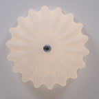 Clérachic Murano-Style Scalloped Glass Flush Ceiling Light seen dead-on from underneath, a full ring of petals around the chrome boss.