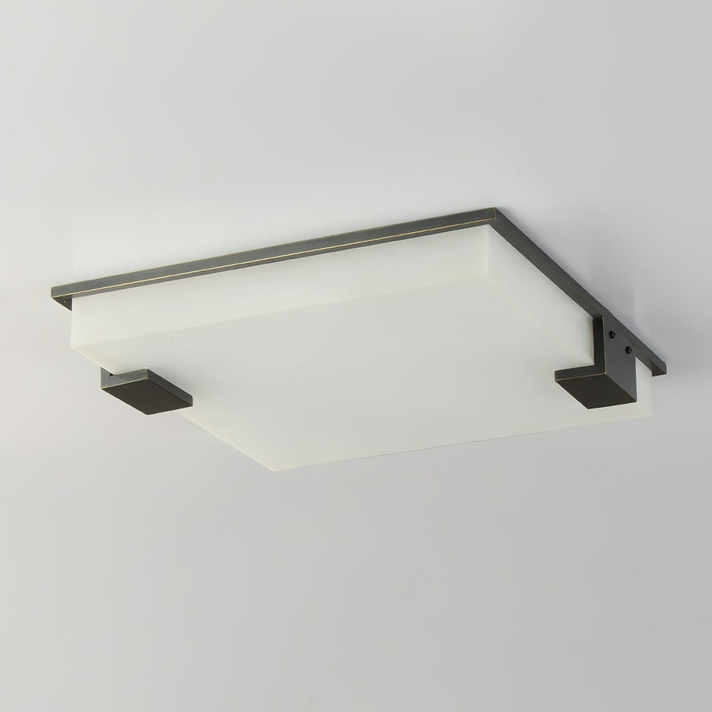 The Clérachic ceiling light photographed edge-on, revealing how shallow the panel sits against the ceiling line.