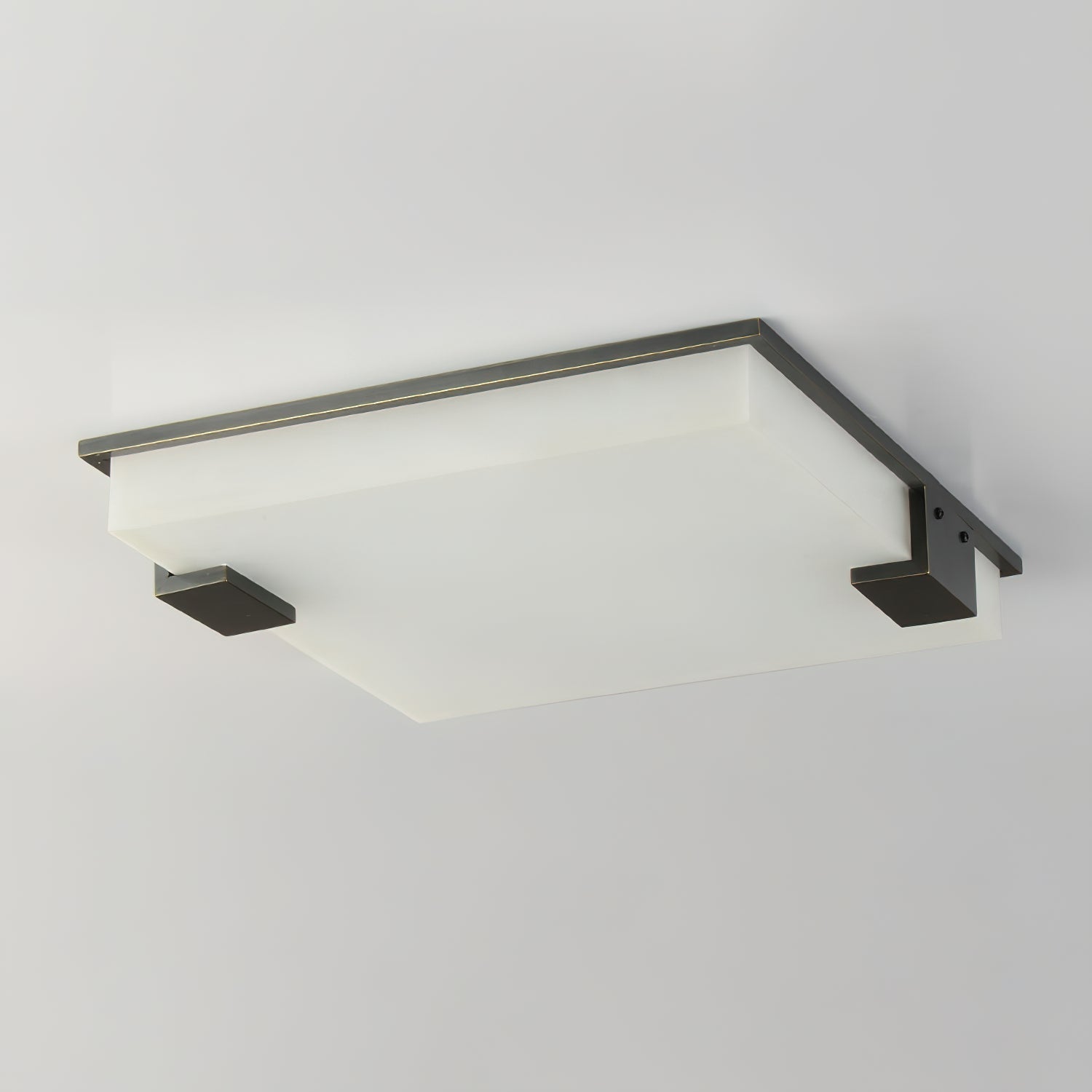 The Clérachic ceiling light photographed edge-on, revealing how shallow the panel sits against the ceiling line.