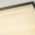The Clérachic diffuser in close-up, a fine brass line running along the frame edge above the warm stone face.