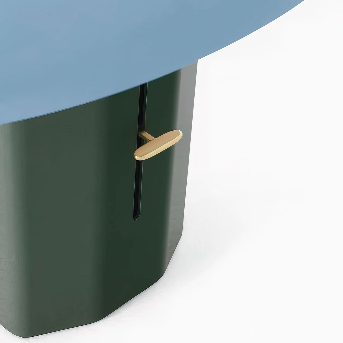 Close view of the brass lever and vertical slot on the green column of this Clérachic table lamp, under the blue shade.