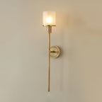 Clérachic Mycara sconce in copper shown straight on, so the full drop from shade to stem tip reads clearly.