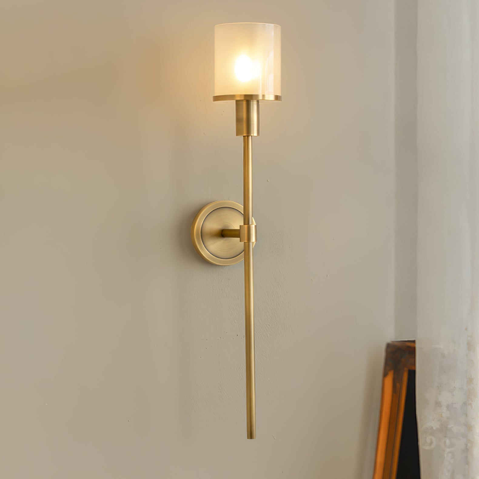 Clérachic Mycara in copper, lit against a warm plaster wall with a timber object just in frame below.