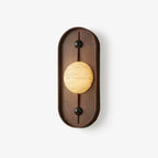 The smaller 20 cm Clérachic size photographed on white, its alabaster orb glowing against a compact walnut oval.