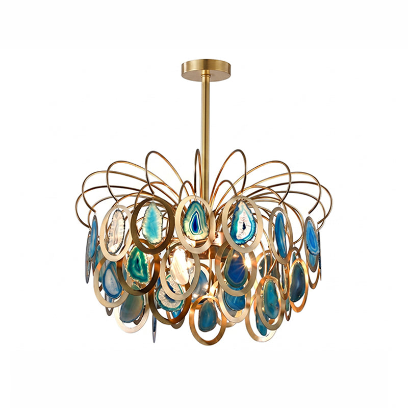 The blue version of this Clérachic agate chandelier on white, with teal and sky-blue slices in gold rings.