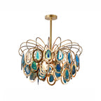 The blue version of this Clérachic agate chandelier on white, with teal and sky-blue slices in gold rings.