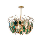 The green version of this Clérachic agate chandelier on white, with deep green and pale jade slices in gold rings.
