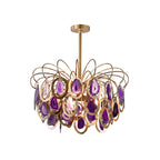 The purple version of this Clérachic agate chandelier on white, with violet and lilac slices in gold rings.