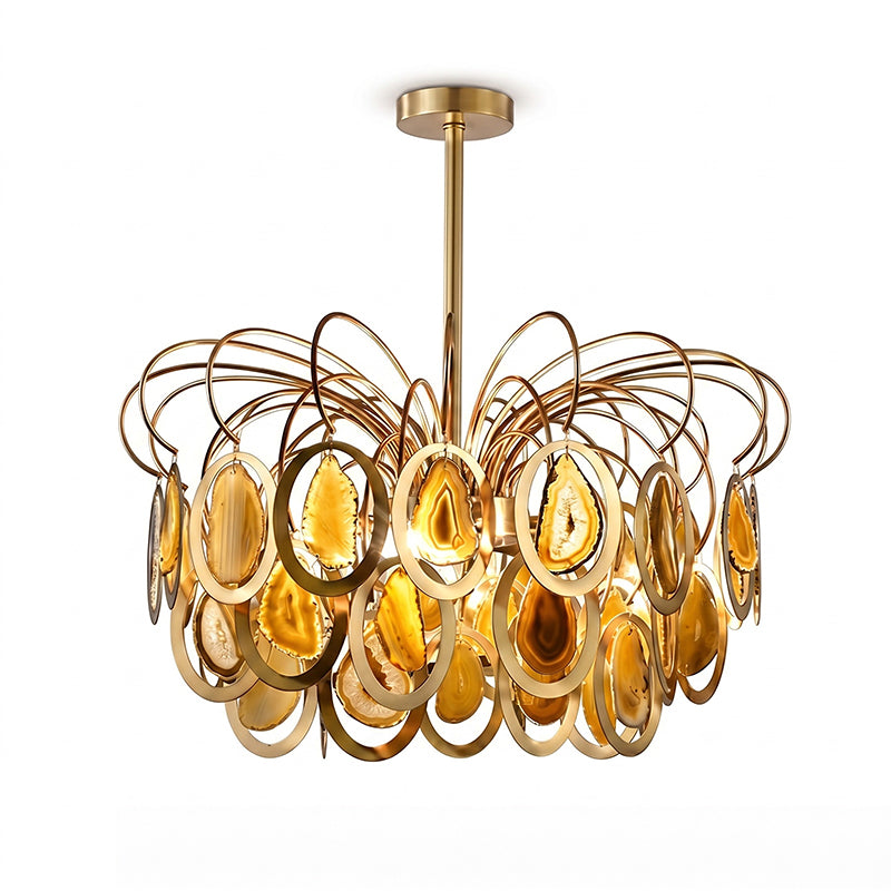 Closer view of the yellow Clérachic agate chandelier, its amber slices glowing in gold rings under the looped brass frame.