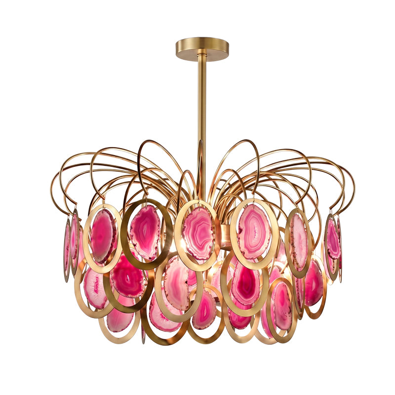 Closer view of the pink Clérachic agate chandelier, with deep rose and magenta slices in gold rings, on white.