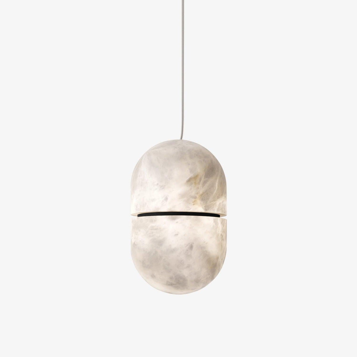 A Clérachic alabaster pendant with a dark band on a pale backdrop, hung from a single thin cord.