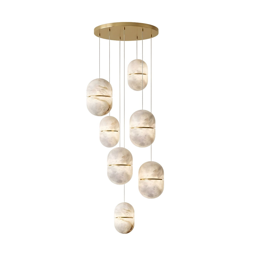 A seven-head Clérachic alabaster pendant cluster with gold bands, hung from a gold round canopy on a white backdrop.