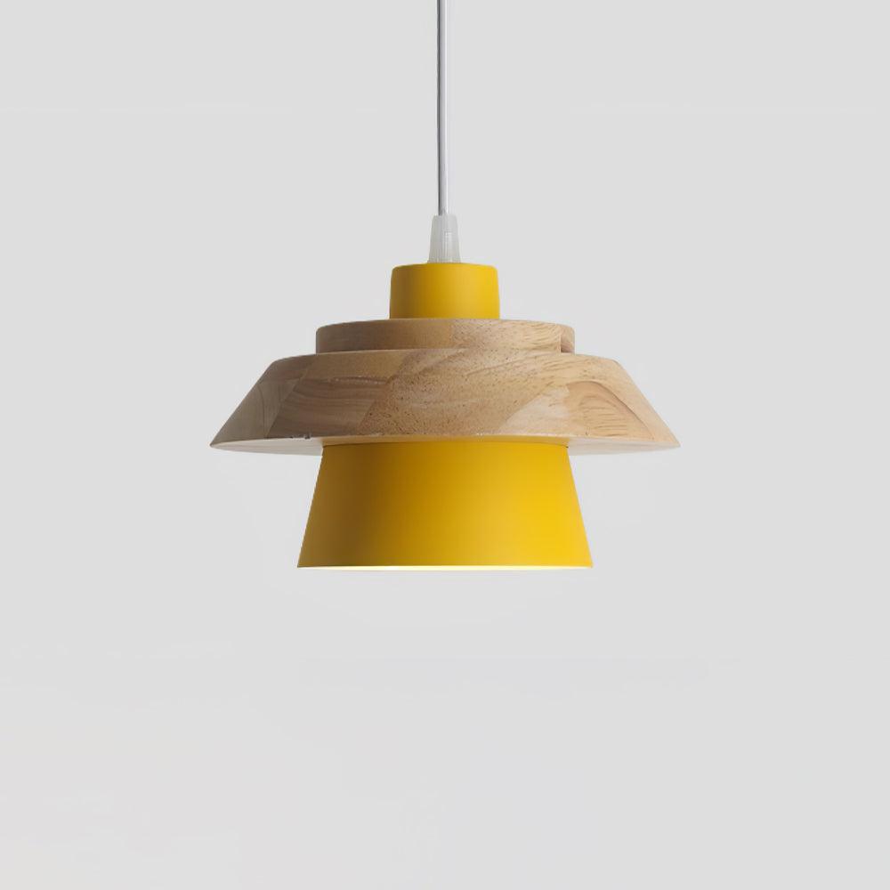 Yellow metal shade under a layered natural wood top and a white cord, on a plain pale grey backdrop, from Clérachic.