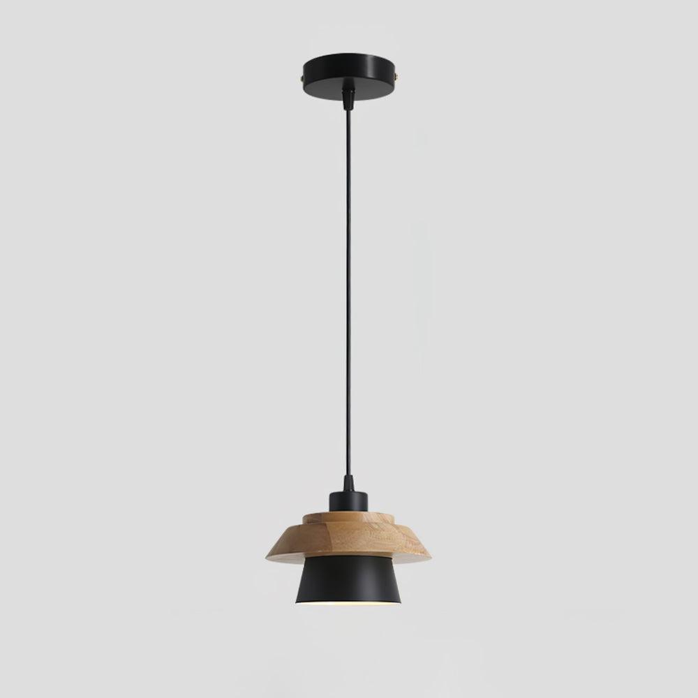 Black metal shade with a layered wood top, a black cord and a round black ceiling canopy, on a pale grey backdrop, from Clérachic.