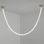 Clérachic gold-capped flexible LED chandelier drops in one glowing white loop against a plain grey corner.