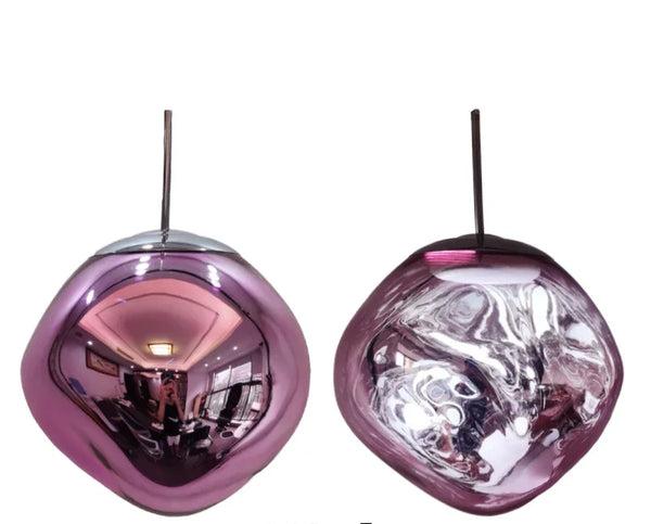 Clérachic melt pendant in pink, shown mirrored and then lit from within.