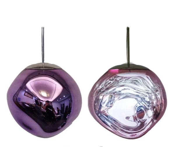 The Clérachic melt pendant in purple, mirrored shell beside the lit rippled version.