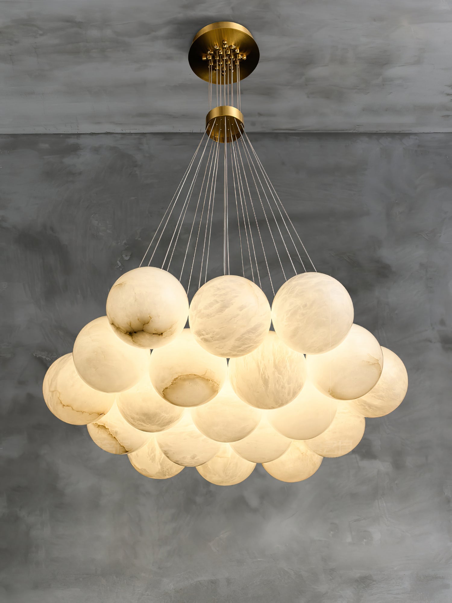 Clérachic lights the Norduvyd from a low angle, the deep cluster glowing amber through layered alabaster stone.