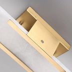 Clérachic sconce in macro, the brass mounting bracket and its fixing screw set against the stone