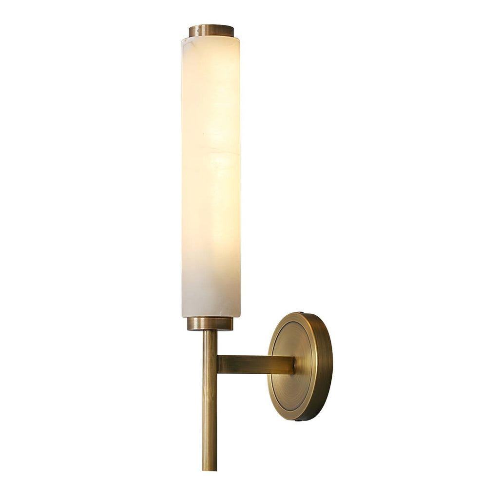 The Clérachic Olrinyra in brass on white, lit and angled so the depth of the wall bracket is visible.