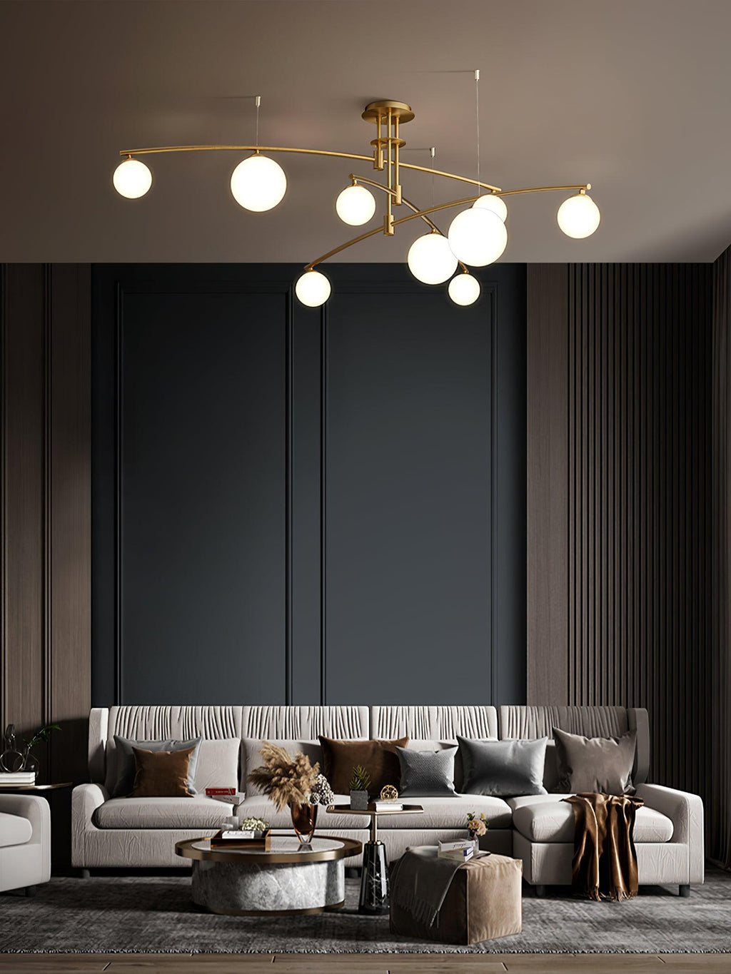 Gold Clérachic chandelier with opal globes above a cream sofa with brown cushions, against dark wood-panelled walls.