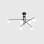 Black Clérachic chandelier with six opal globes on thin crossing arms, lit, on a pale grey backdrop.