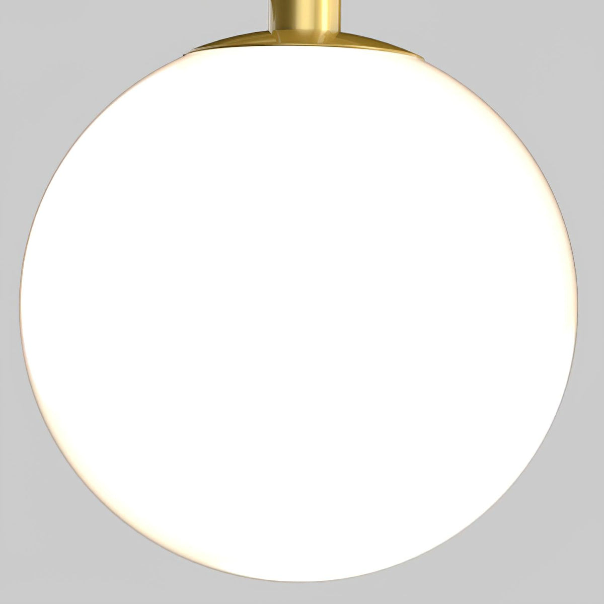 Close view of one frosted opal glass globe on the Clérachic chandelier, glowing white below its gold cap.