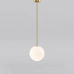 Medium opal sphere on a brass rod with a brass cap at the ceiling, this Clérachic pendant on a light grey backdrop.