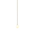 Lit opal sphere hanging from a very long brass rod, this Clérachic pendant on a white backdrop.