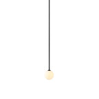 Lit opal sphere hanging from a very long black rod, this Clérachic pendant on a white backdrop.