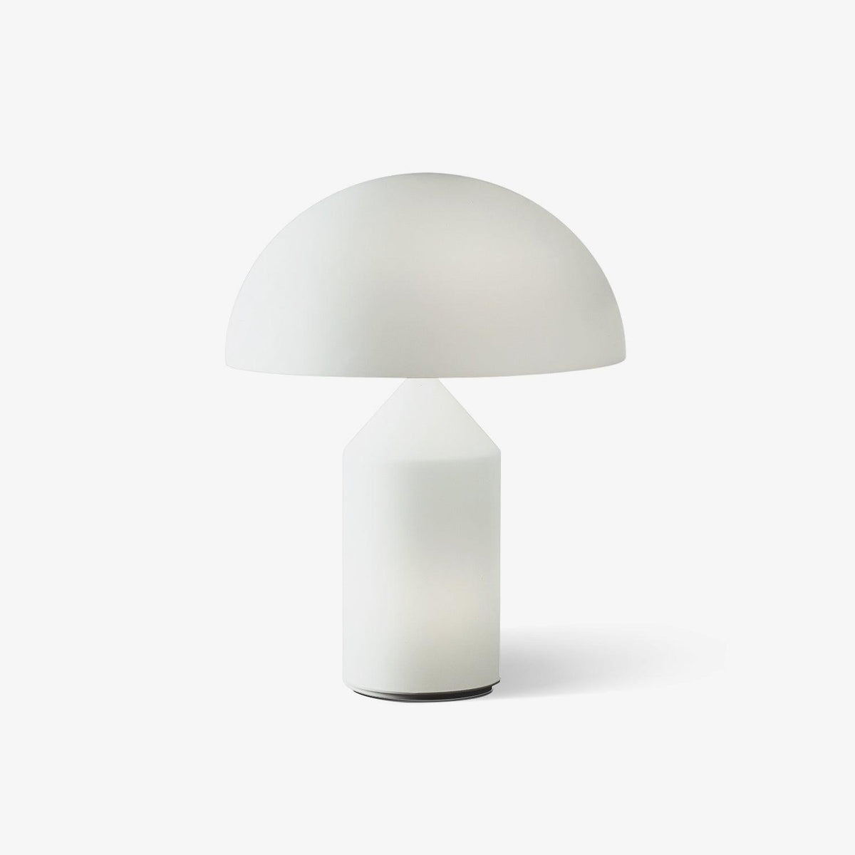 This Clérachic table lamp on a plain white backdrop, a milk-white glass dome shade over a smooth cone-topped cylinder base.