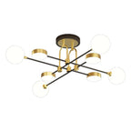 Overhead angle of the Clérachic Opal Globe Ceiling Light's 6-light version, isolated on white to show the crossed-arm spread.