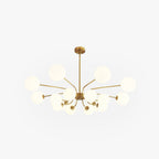 A Clérachic opal-globe sputnik chandelier in warm gold, shown alone with all light arms and glass globes visible against a plain background.