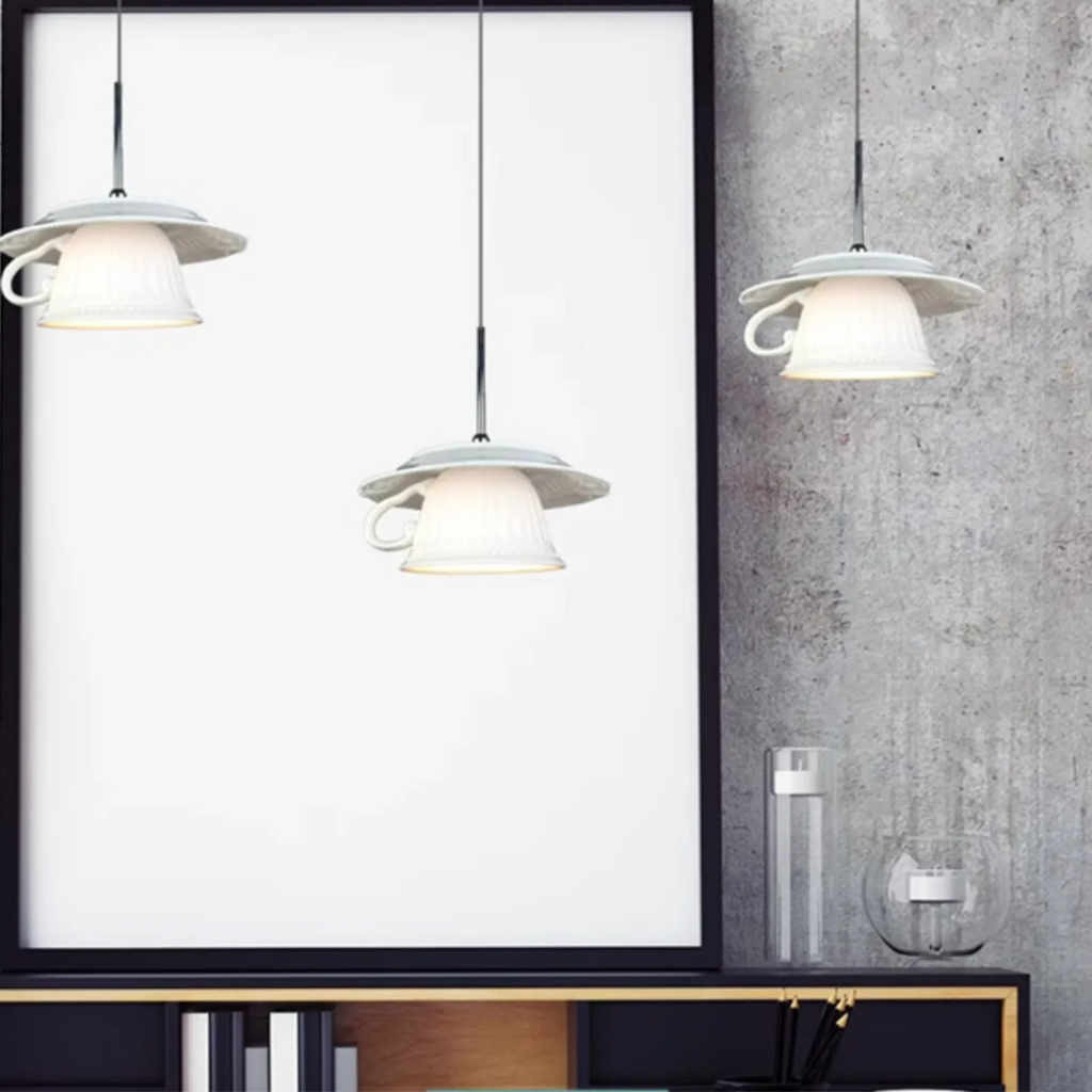 Clérachic pendant light in a room setting over a desk.