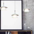 Clérachic pendant light in a room setting over a desk.