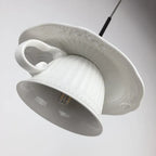 Clérachic pendant light from below, showing the open shade and the holder.