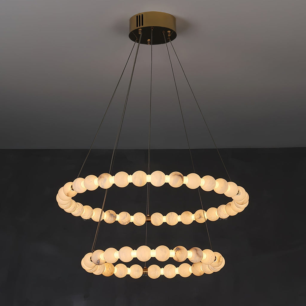 Clérachic Orb chandelier in a two-ring build, the smaller ring hanging beneath the larger.