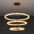 Clérachic Orb chandelier in a three-ring build, the tiers narrowing towards the floor.