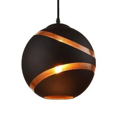Close-up of the black Clérachic glass globe shade, showing its matte finish and copper-lined orbit bands.