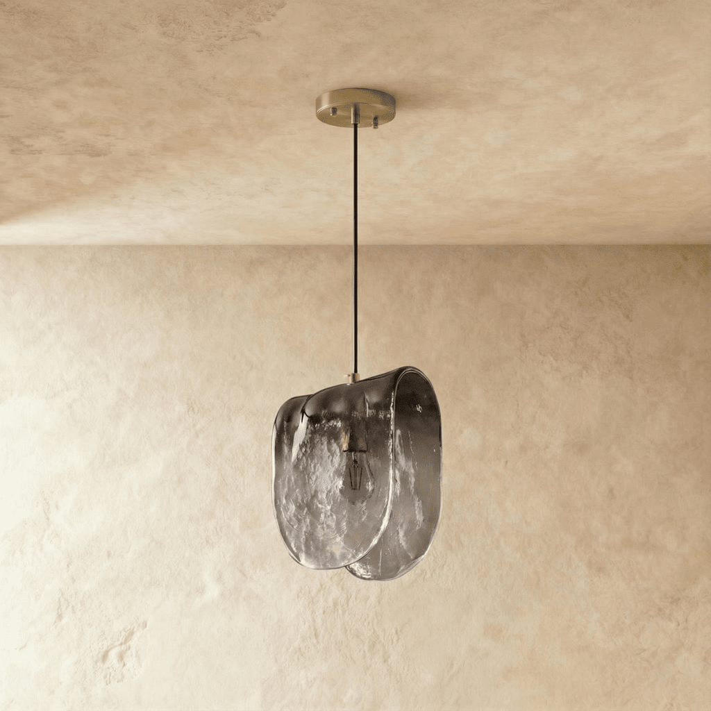 Clérachic single smoked glass pendant with a folded, rippled shade and brushed metal canopy, switched off on plaster.