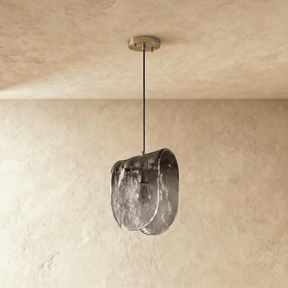 Clérachic single smoked glass pendant with a folded, rippled shade and brushed metal canopy, switched off on plaster.