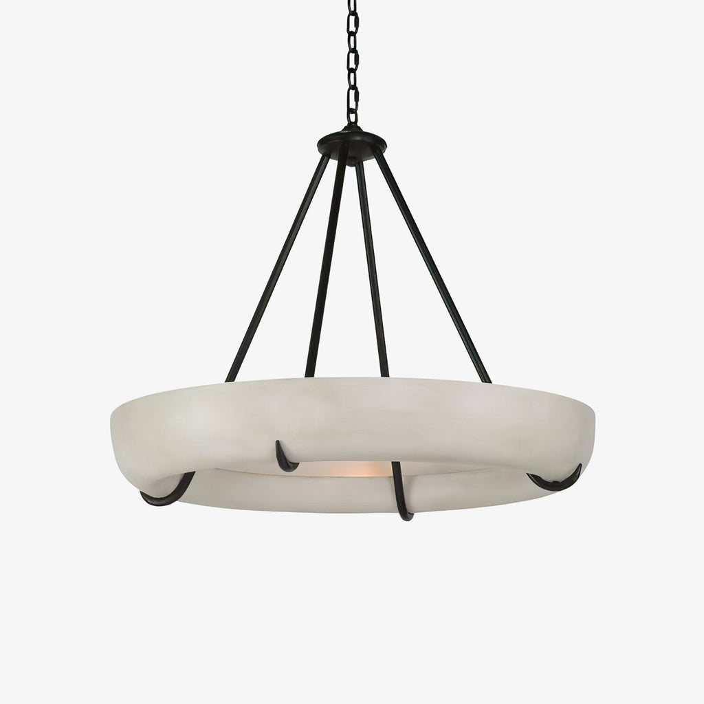 The Clérachic Orion alabaster chandelier with its black chain and canopy above the stone bowl.