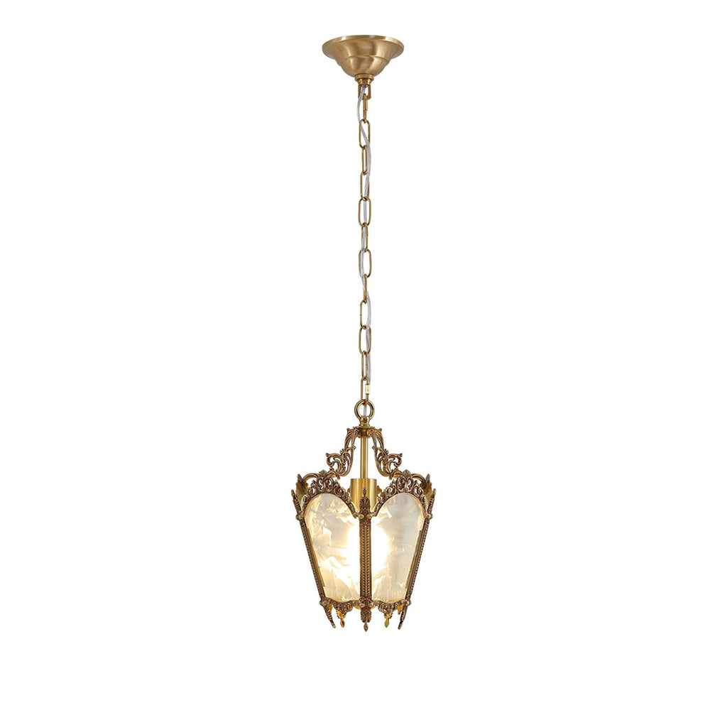 Brass lantern pendant with a chain and a domed ceiling canopy, small in a white frame, from Clérachic.