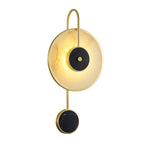 The Clérachic Orphaa photographed close, showing the veining in the alabaster disc and the honed black marble centre.