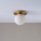 Clérachic Orrila ceiling mount fitted flush to a white ceiling above a pale grey wall.