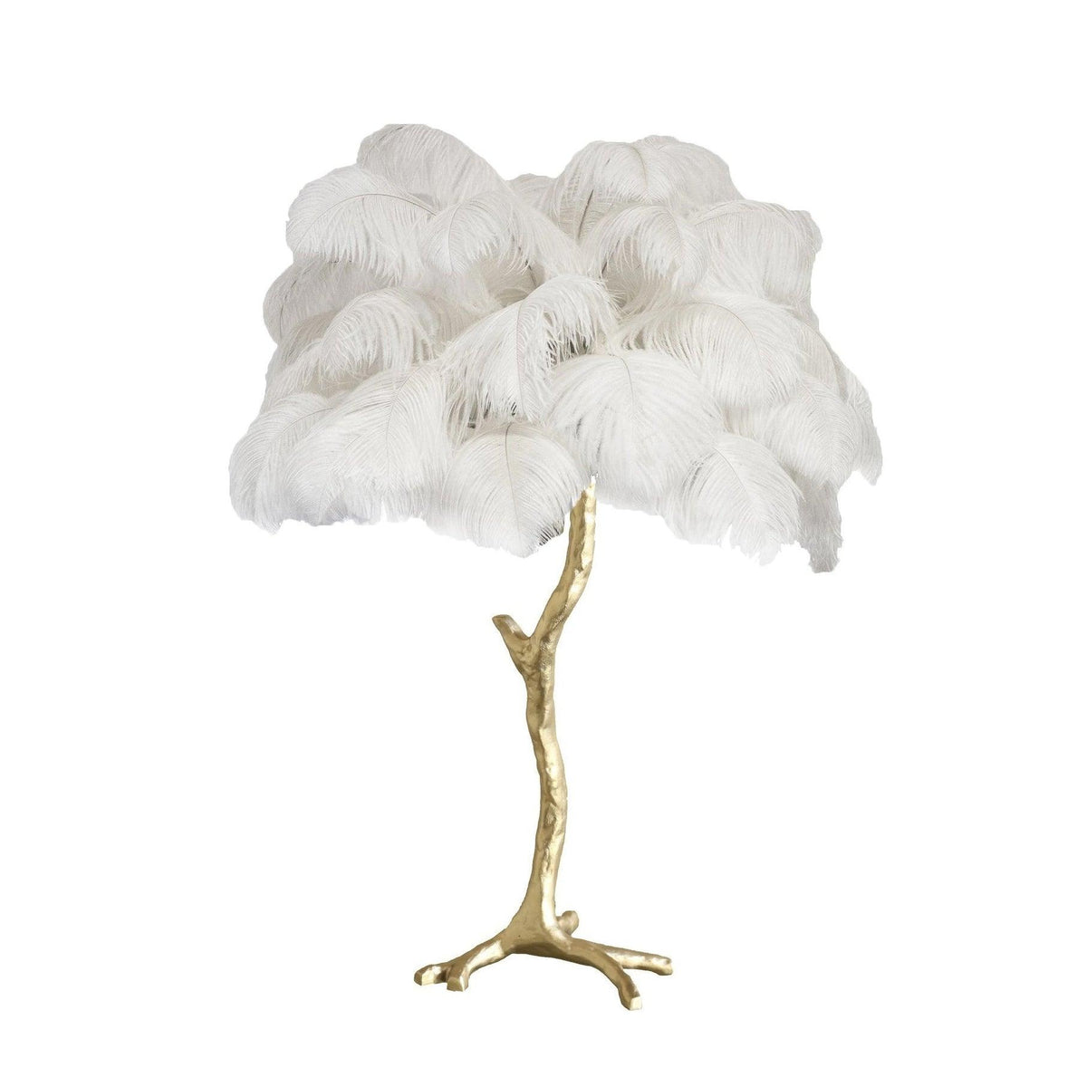 Clérachic table lamp with fluffy white ostrich feathers on a gold branch stem with splayed feet, on a plain white background.