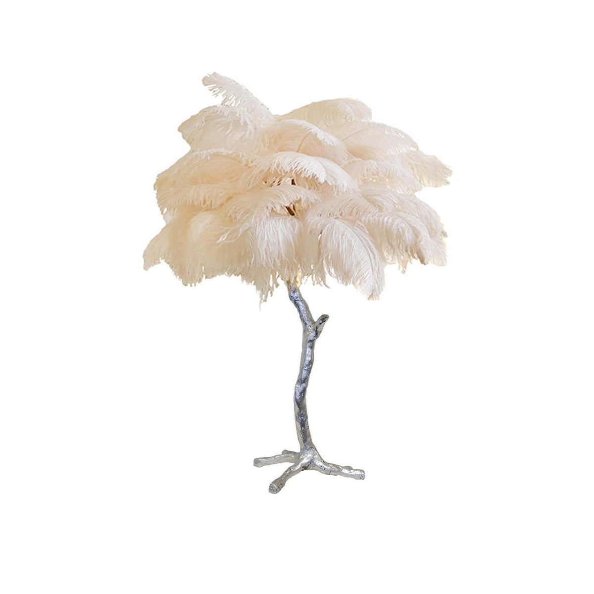 Clérachic table lamp with a cream-coloured feather shade on a silver branch stem with splayed feet, on a plain white background.