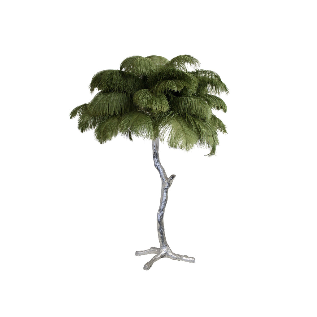 Clérachic table lamp with moss-green feathers on a silver branch stem, shown on a white background.